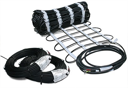 Heat cable in individual lengths or pre-spaced in mats are available for radiant driveway heating system. Heat cable and cable pre-spaced in mats for radiant driveway heating system.